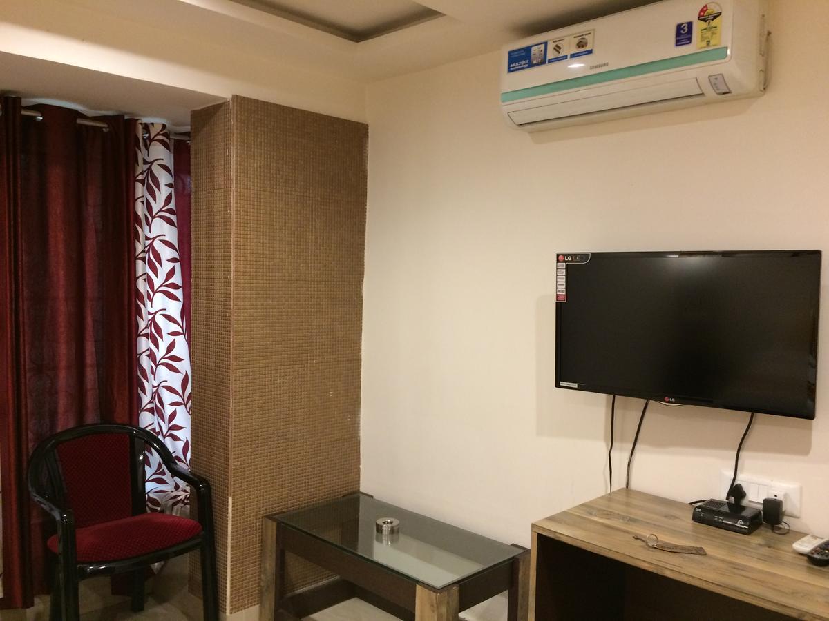 Breeze Hotel Силигури Экстерьер фото